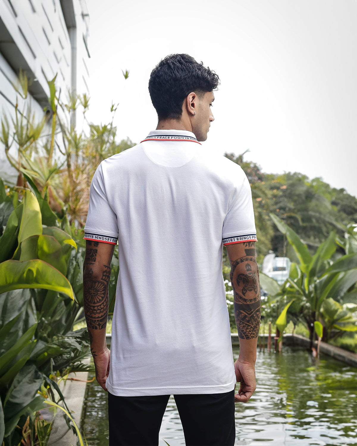 Men's White Polo T-Shirt with 'Positive Mindset Brings Peace' Print on Collar and Sleeves