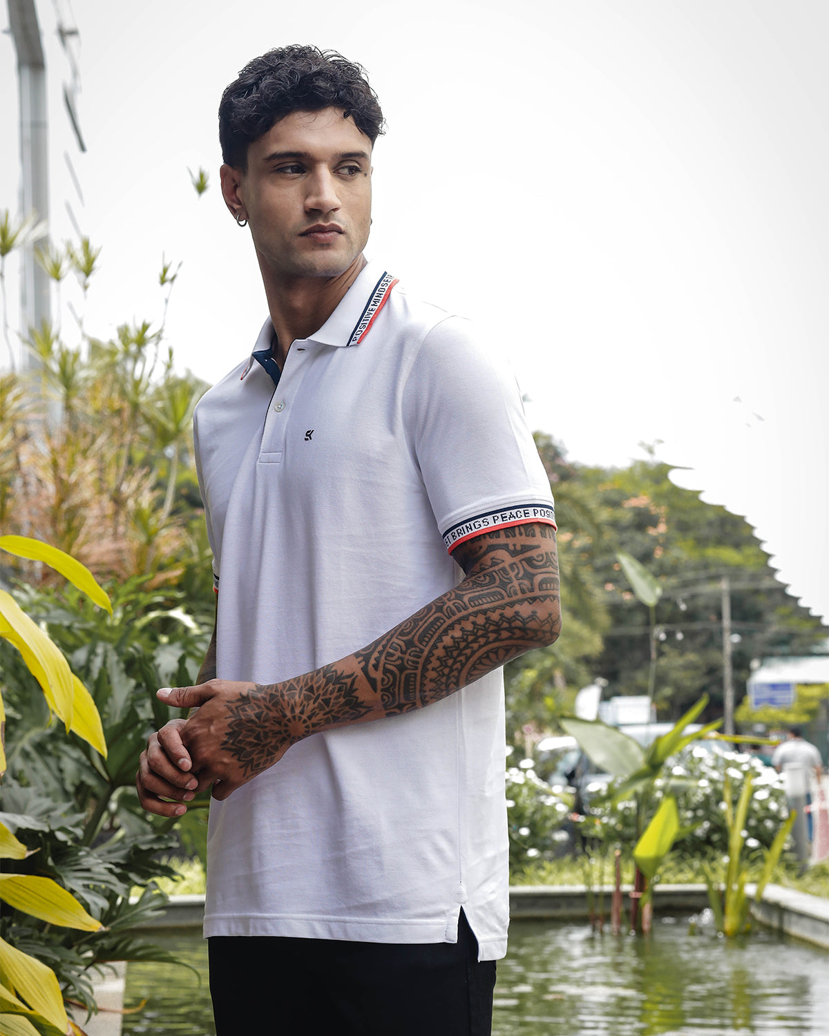 Men's White Polo T-Shirt with 'Positive Mindset Brings Peace' Print on Collar and Sleeves
